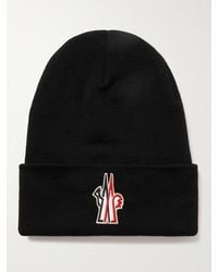 Moncler - Logo-Appliquéd Ribbed Wool Beanie - Lyst