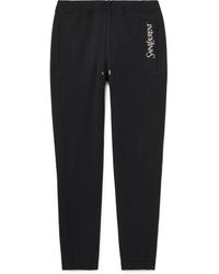 Saint Laurent - Tapered Logo-embroidered Cotton-jersey Sweatpants - Lyst