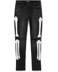 Amiri - Bones Skinny-Fit Appliquéd Distressed Jeans - Lyst
