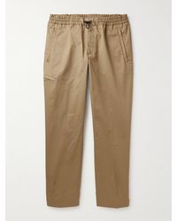 Moncler - Tapered Cotton-Blend Gabardine Trousers - Lyst