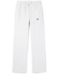 Palm Angels - Wide-leg Logo-embroidered Lyocell And Cotton-blend Twill Drawstring Trousers - Lyst