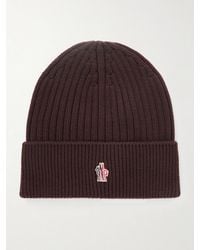 Moncler - Logo-Appliquéd Ribbed Virgin Wool Beanie - Lyst