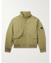 C.P. Company - Wattierte Bomberjacke aus "Pro-Tek"-Material mit Logoapplikation - Lyst