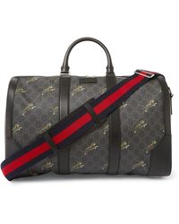 Gucci Leather-trimmed Monogrammed Coated-canvas Holdall - Black