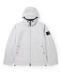 Stone Island - Logo-appliquéd Padded Shell-r_e.dye® Hooded Jacket - Lyst