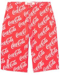ERL - Coca-cola Straight-leg Distressed Printed Cotton-canvas Shorts - Lyst