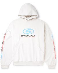 Balenciaga - Oversized Logo-print Distressed Cotton-jersey Hoodie - Lyst