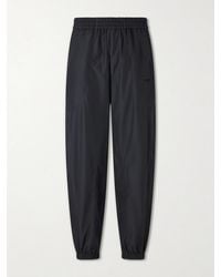 Givenchy - Tapered Cotton-Blend Shell Sweatpants - Lyst