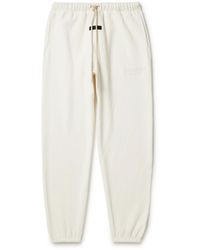 Fear Of God - Tapered Logo-appliquéd Cotton-blend Jersey Sweatpants - Lyst