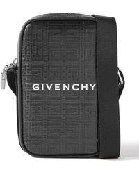 Givenchy - Leather-trimmed Logo-embossed Coated-canvas Messenger Bag - Lyst