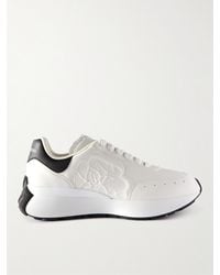 Alexander McQueen - Sneakers basse bianche con linguetta logo - Lyst
