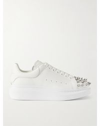 Alexander McQueen - Sneakers in pelle con suola oversize e borchie - Lyst