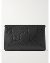 Gucci - Logo-debossed Full-grain Leather Pouch - Lyst