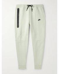 Nike - Pantaloni sportivi a gamba affusolata in Tech Fleece di misto cotone con logo - Lyst