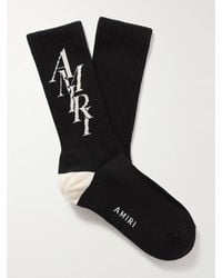 Amiri - Stack Logo-jacquard Ribbed Cotton-blend Socks - Lyst