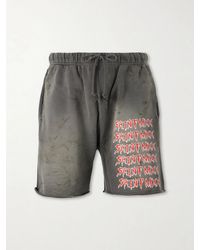 SAINT Mxxxxxx - Wide-Leg Logo-Print Distressed Cotton-Jersey Drawstring Shorts - Lyst