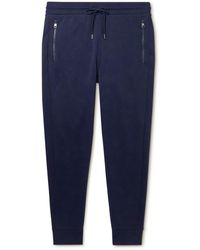 Moncler - Tapered Logo-appliquéd Shell-trimmed Cotton-jersey Sweatpants - Lyst