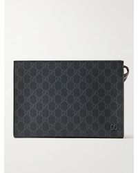 Gucci - Leather-Trimmed Monogrammed Coated-Canvas Pouch - Lyst