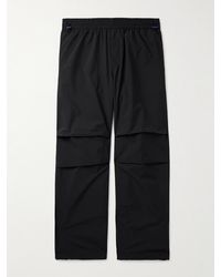 Burberry - Pantaloni cargo a gamba larga in nylon con logo applicato - Lyst