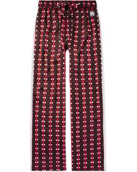 Wales Bonner - Lubaina Himid Snare Straight-leg Crochet-trimmed Printed Jersey Trousers - Lyst