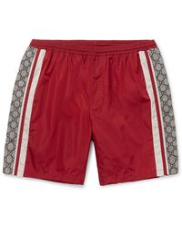 red gucci swim shorts
