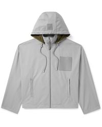 Loewe - Logo-Debossed Leather-Trimmed Cotton-Twill Hooded Jacket - Lyst
