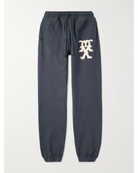 SAINT Mxxxxxx - Tapered Logo-Print Cotton-Blend Jersey Sweatpants - Lyst