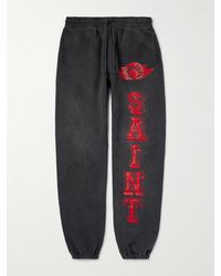 SAINT Mxxxxxx - Pantaloni sportivi a gamba affusolata in jersey di cotone con logo Angel of Death - Lyst