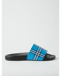 blue burberry slides
