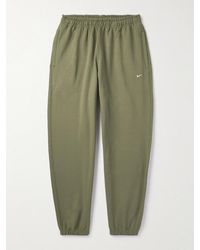 Nike - Solo Swoosh schmal zulaufende Jogginghose aus Jersey aus einer Baumwollmischung mit Logostickerei - Lyst