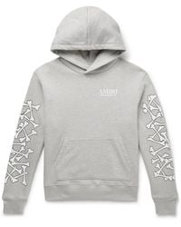 Amiri - Bones Stacked Logo-Appliquéd Printed Cotton-Jersey Hoodie - Lyst