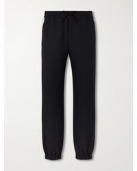 Valentino Garavani - Tapered Logo-appliqued Striped Drill Sweatpants - Lyst