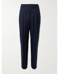 Brunello Cucinelli - Tapered Pleated Pinstriped Wool And Cotton-blend Trousers - Lyst