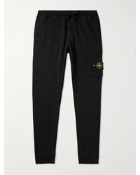 Stone Island - Tapered Garment-Dyed Cotton-Fleece Sweatpants - Lyst