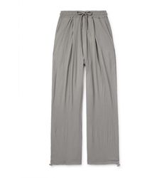 Frankie Shop - Eliott Tapered Pleated Textured Stretch-jersey Drawstring Trousers - Lyst