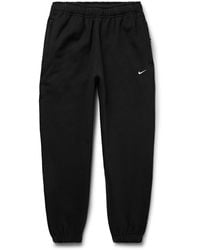 Nike - Solo Swoosh Tapered Logo-Embroidered Cotton-Blend Jersey Sweatpants - Lyst