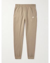 Nike - Pantaloni sportivi a gamba affusolata in jersey di misto cotone con logo ricamato NSW - Lyst