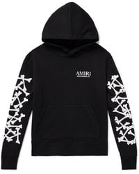 Amiri - Bones Stacked Logo-Appliquéd Printed Cotton-Jersey Hoodie - Lyst