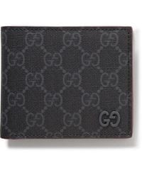 Gucci - GG Supreme Monogrammed Coated-canvas And Pebble-grain Leather Billfold Wallet - Lyst