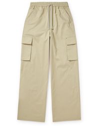 FRAME - Wide-leg Cotton-blend Twill Drawstring Cargo Trousers - Lyst
