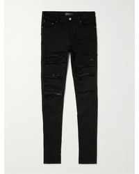 Amiri - Thrasher Skinny-fit Leather-panelled Distressed Jeans - Lyst