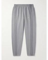 adidas Originals - Pantaloni sportivi a gamba affusolata in jersey di misto cotone con righe - Lyst