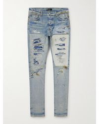 Amiri - Skinny-fit Logo-embroidered Distressed Patchwork Jeans - Lyst