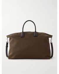 Saint Laurent - Bowling Leather-Trimmed Cotton-Canvas Weekend Bag - Lyst