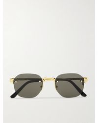 Cartier - Santos de Cartier rahmenlose ovale Sonnenbrille mit goldfarbenen Details - Lyst