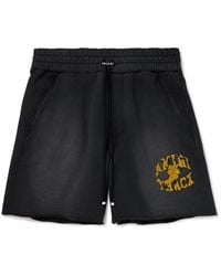 Amiri - Straight-leg Logo-flocked Distressed Cotton-jersey Drawstring Shorts - Lyst