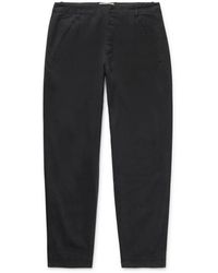 Folk - Black Assembly Tapered Pleated Cotton-canvas Trousers - Lyst