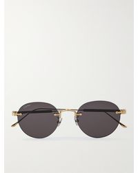 Cartier - Rahmenlose Sonnenbrille mit goldfarbenen Details - Lyst