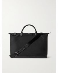 WANT Les Essentiels - Hartsfield 2.0 Leather-trimmed Nylon Weekend Bag - Lyst