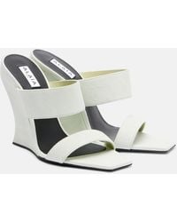 Alaïa - Wave 110 Suede Wedge Mules - Lyst